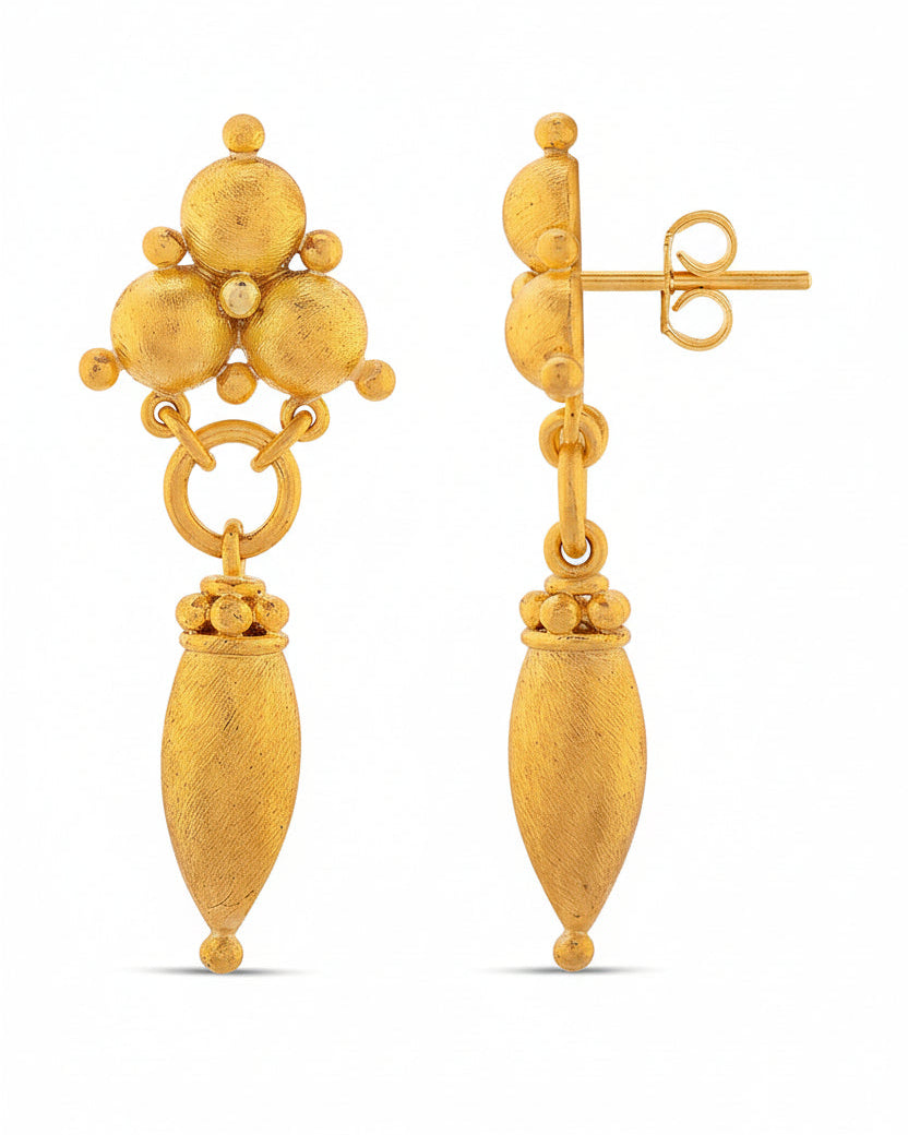Pair of gold earrings on a white background ancient Greek amphora style