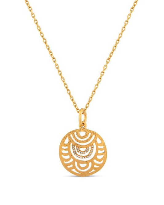 A gold-colored pendant with a geometric fan design, centered with a small diamond, on a separate chain.