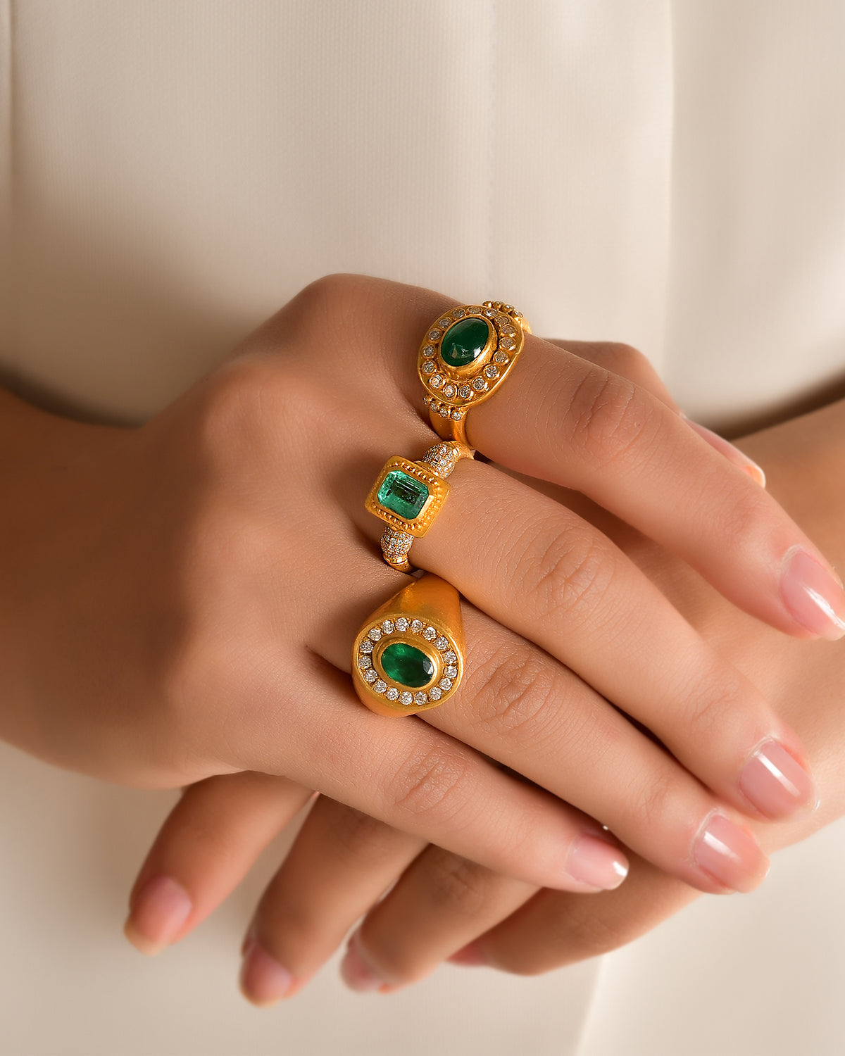 Oval Emerald Ring with Diamond Halo