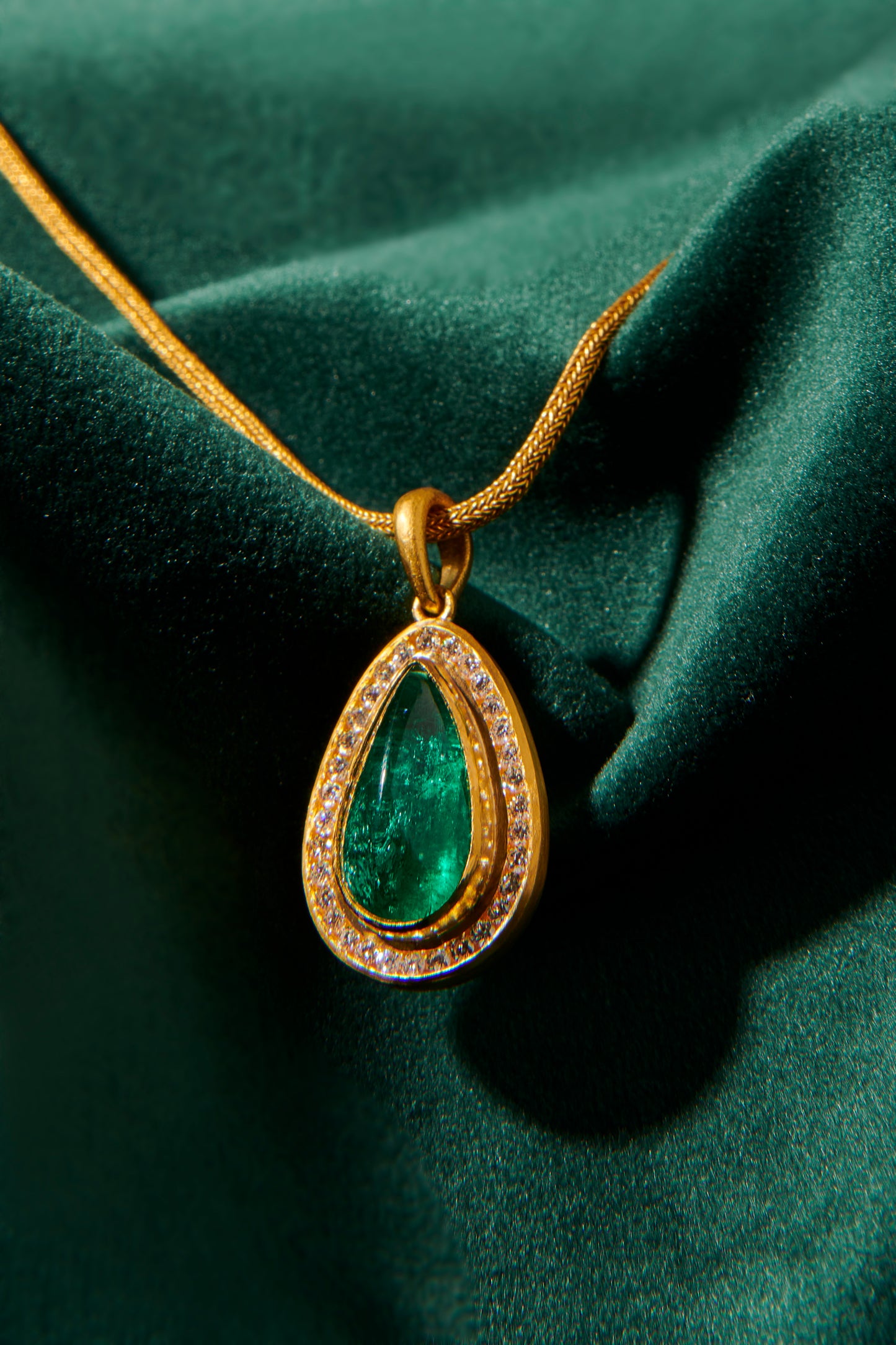 Teardrop Emerald and Diamond Halo Pendant