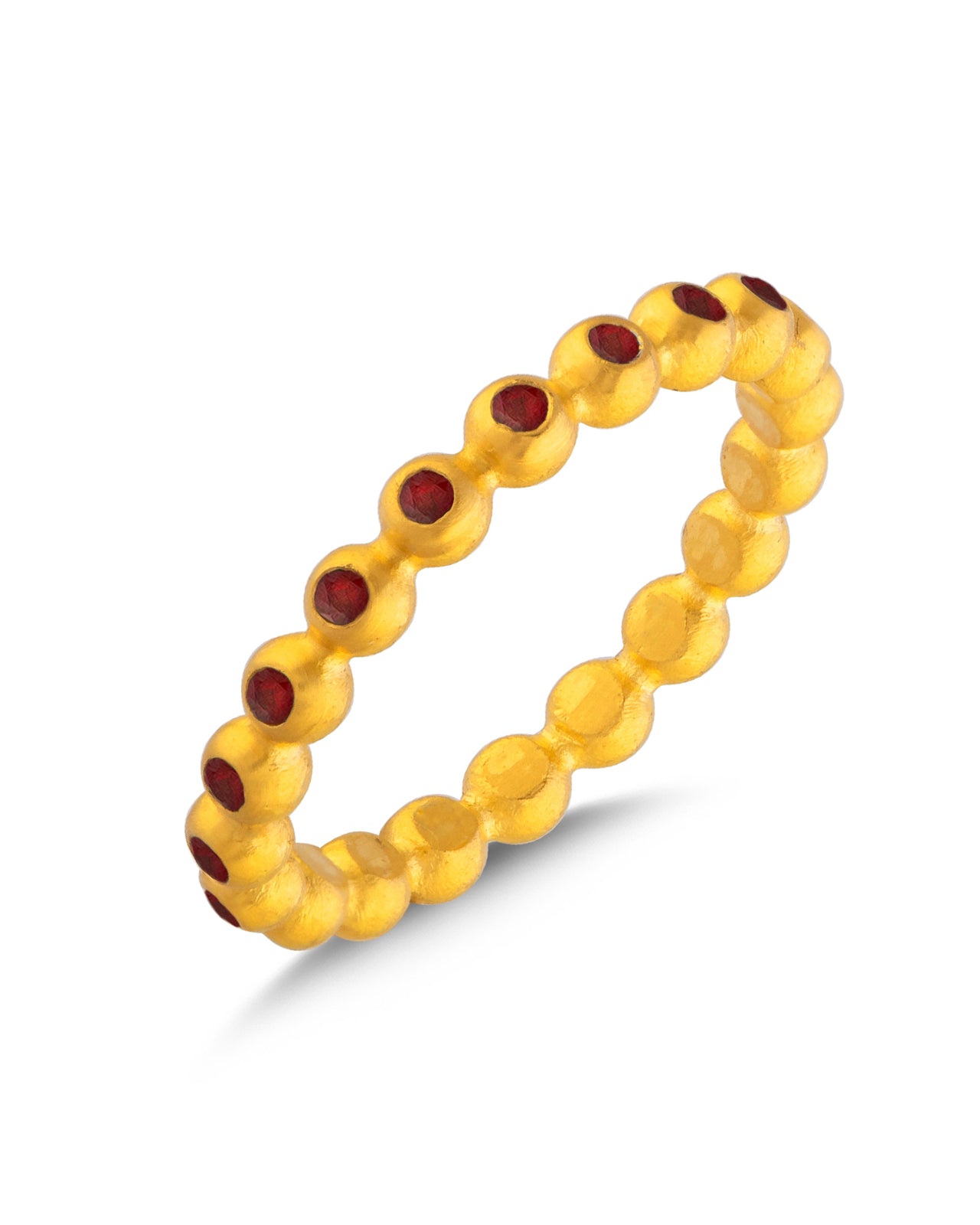 Yellow beaded bracelet with red stones on a white background