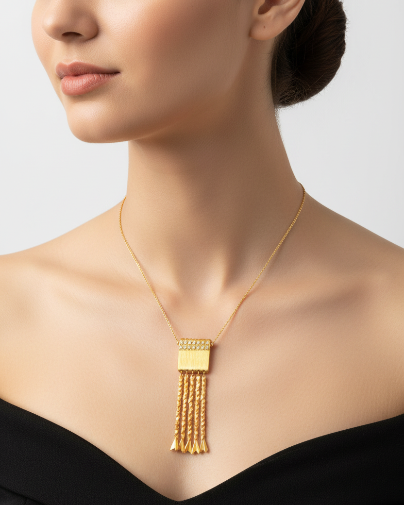A yellow diamond necklace with a textured design on the chain.